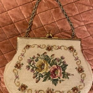 Floral needlepoint shoulder bag with golden chain strap